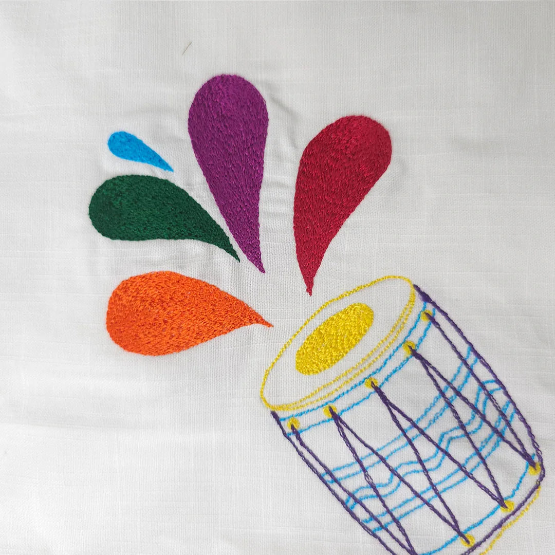 Keebee Organic Cotton Colorful Dholak Embroidered White Kurta paired with Pajama Pants